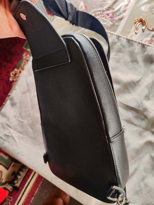 Louis Vuitton sling bag taiga