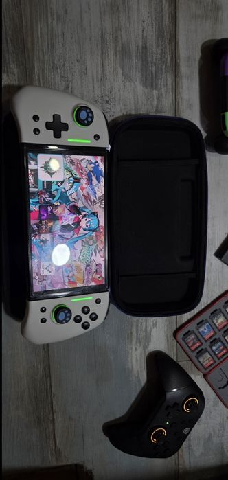 Nintendo Switch OLED moded - 512GB + 4 Joy-Con + 11 игри в кутия и калъф