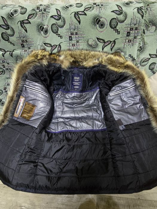 Пуховик новый...