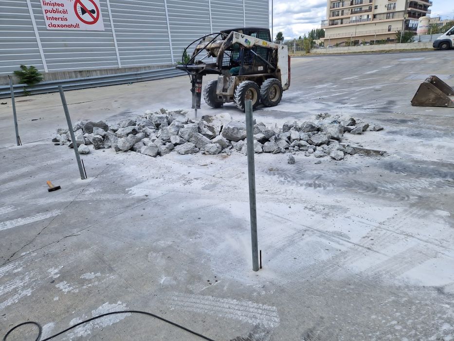 Bobcat de inchiriat Taiere beton gauri gard burghiu pamant sfredel