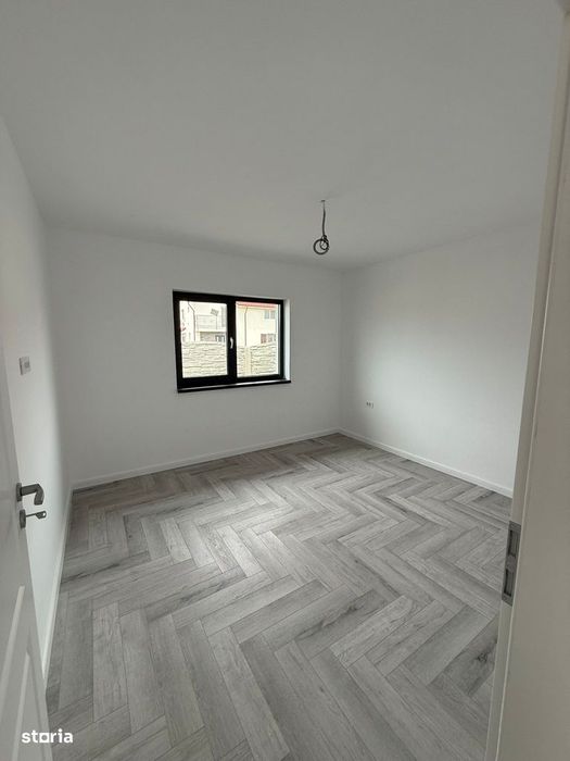 Casa pe parter cu 4 camere , incalzire in pardoseala , teren 400 mp
