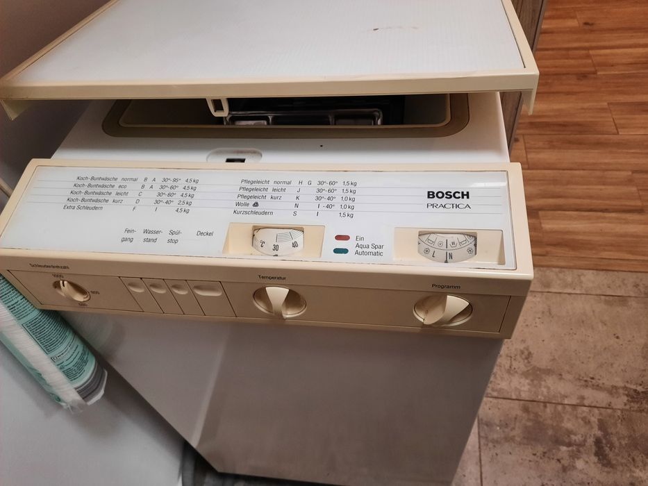 Mașina spalat haine verticala Bosch