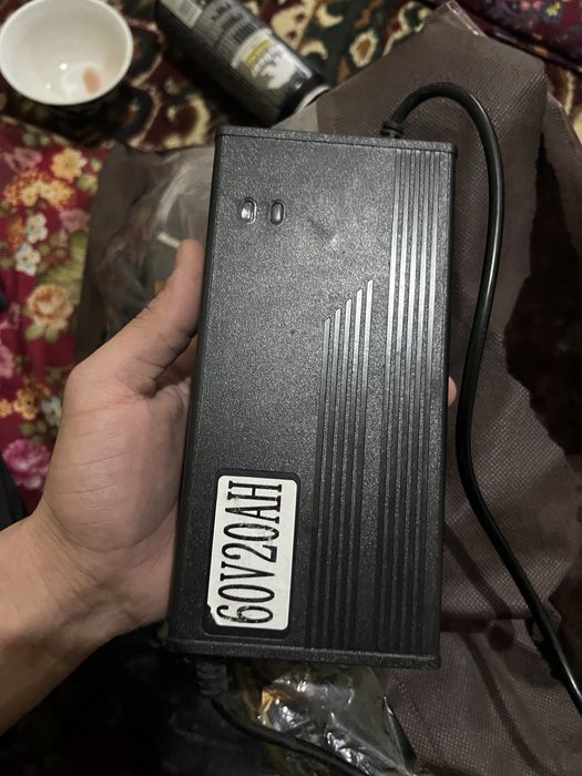 Зарядчик для скутер