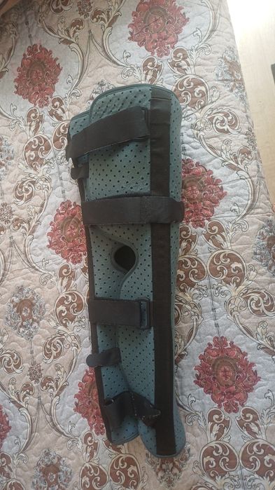 Коленный тутор бандаж