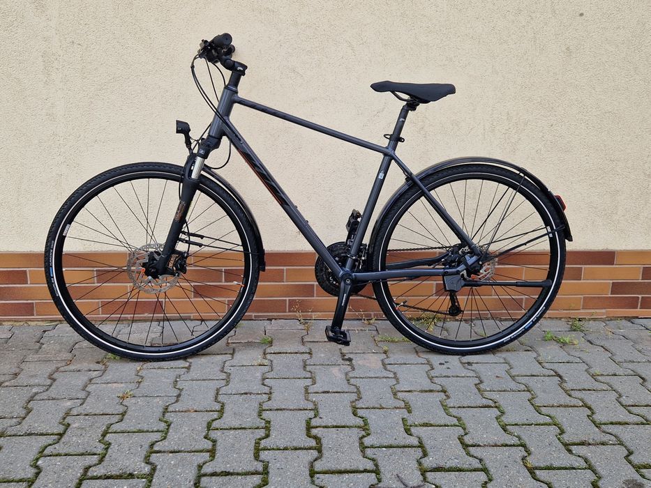 Bicicleta Hybrid KTM Cross Road 28 Aluminiu mecanica și frâne Shimano model nou cadru 51 M 3x9vit dinam led fata spate gume noi Schwalbe Huricane