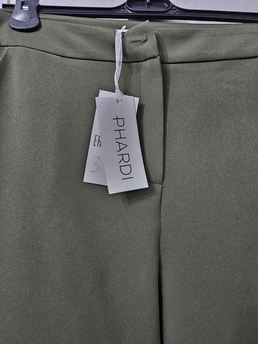 Новые женские брюки 42(+6)