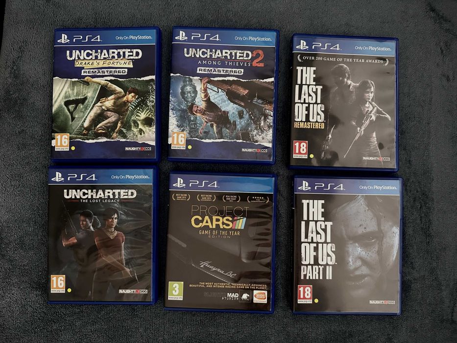 Consola PS4 Slim + jocuri și manetă