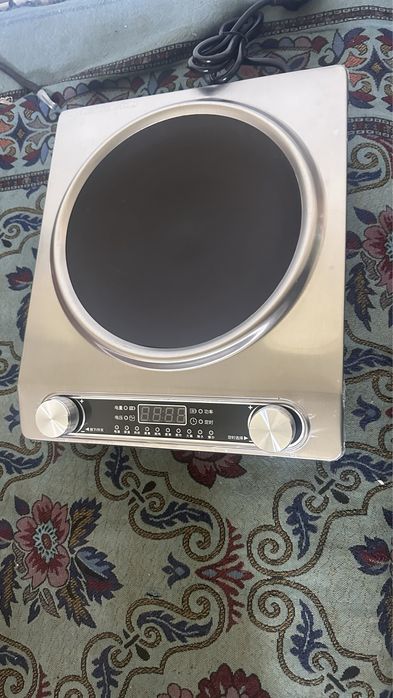 индукционная плита новый