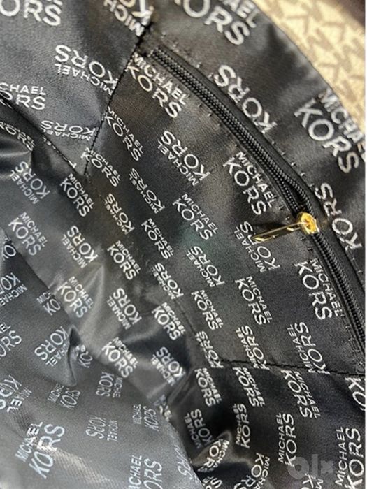 Кожаная сумка Michael Kors