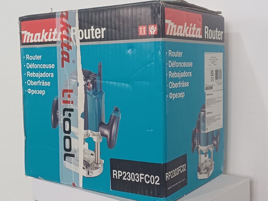 Фрезер Makita RP2303FC