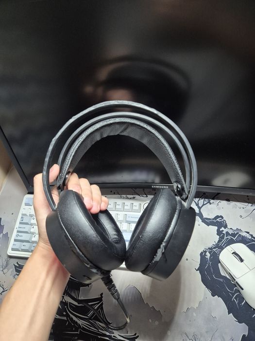 Продам наушники Tanbow C3U