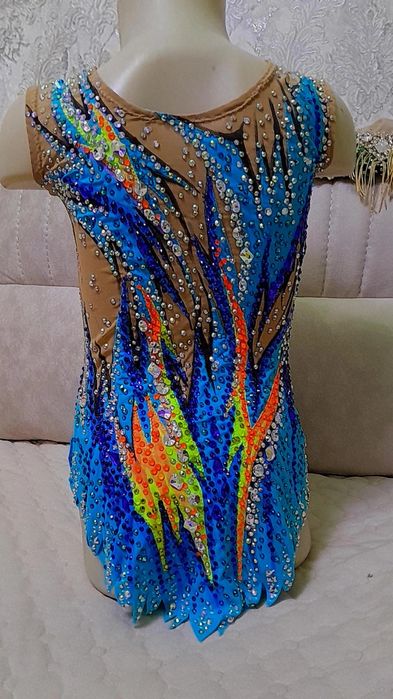 Новый купальник  на 8-9лет.рост 130-138с