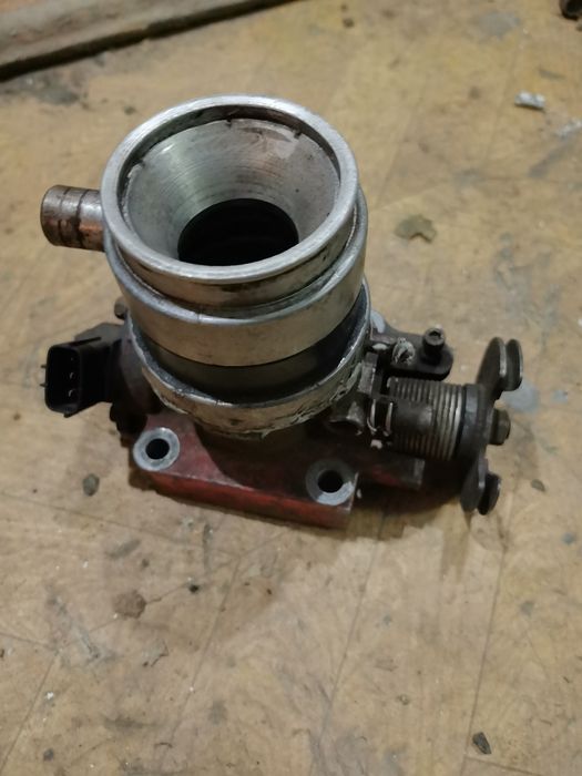 Мазда Демио 2000гв дроссельная заслонка.