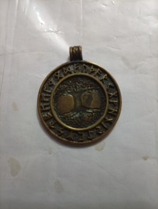 Антиквар медал жуда эски
