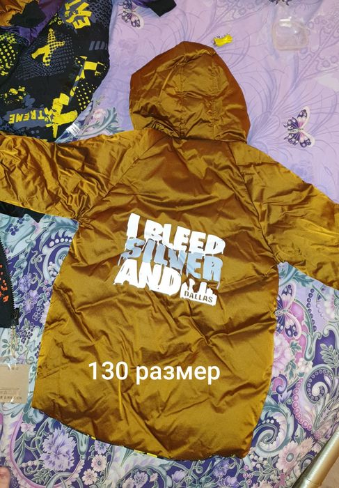 Двустороннии новые куртки