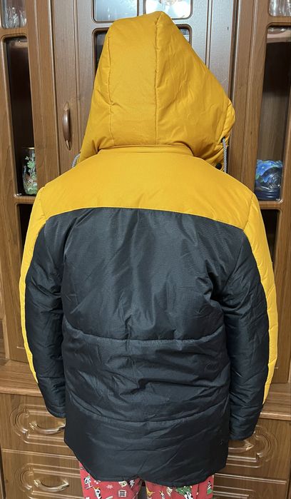 Куртки,пальто.