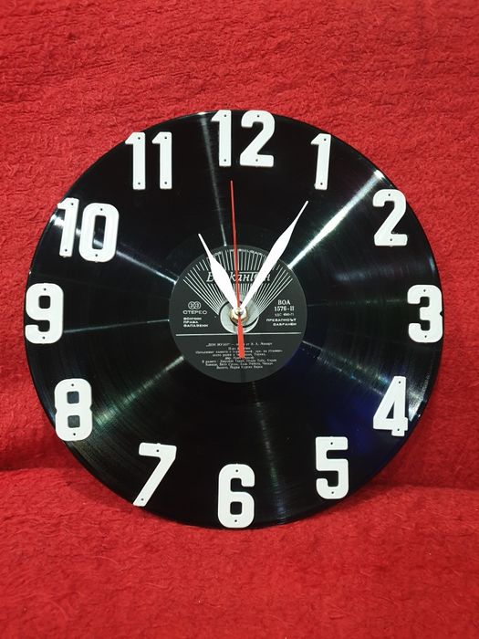 Стенен часовник от истинска плоча