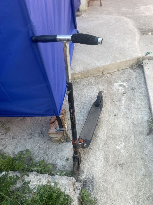 Trotineta de vanzare in stare bunicica