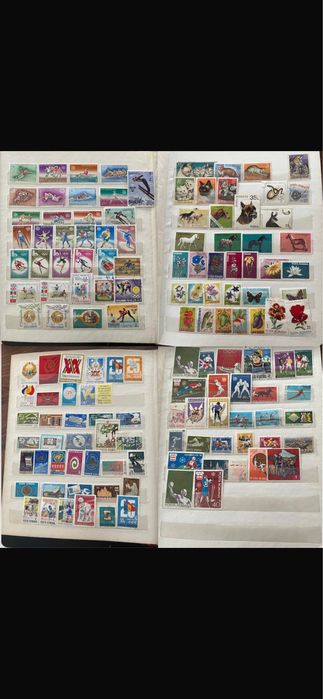 2 clasoare continand 817 timbre vechi