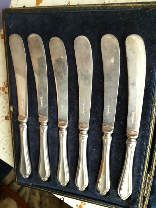 Vechi set cutite din argint