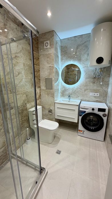 Нов двустаен апартамент с морска гледка + подземен паркинг