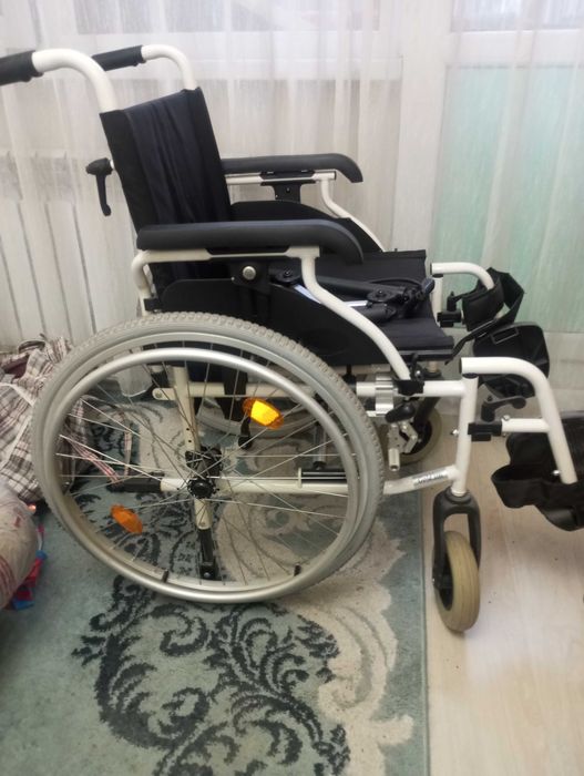 Инвалидное кресло
