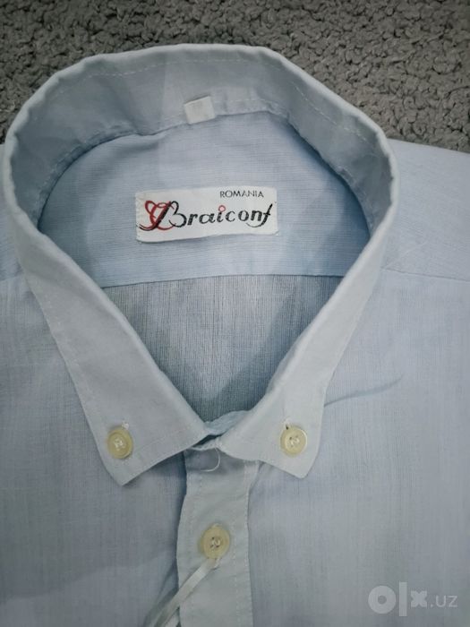 Продаётся Новая привозная рубашка.размер L(38)голубая.
