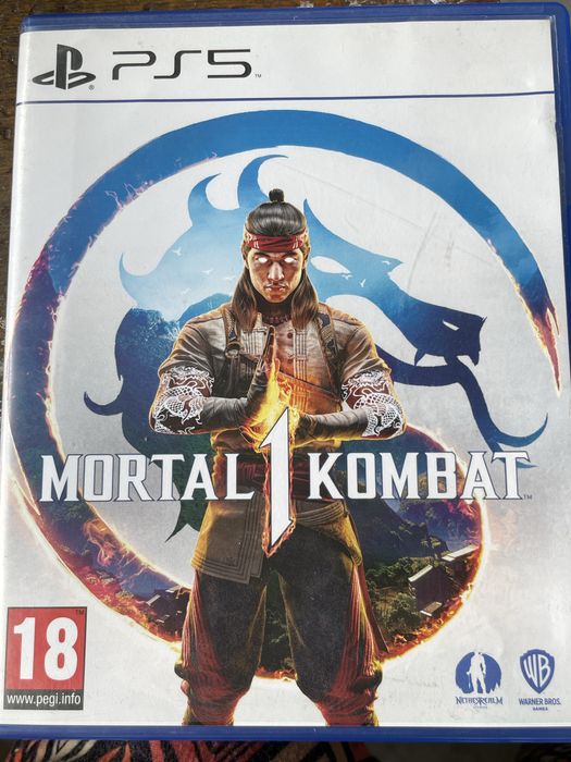 Диски PlayStation Spider-Man и Mortal Kombat