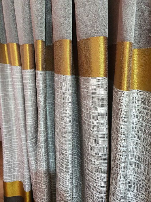 Завеси два броя 75 лева.