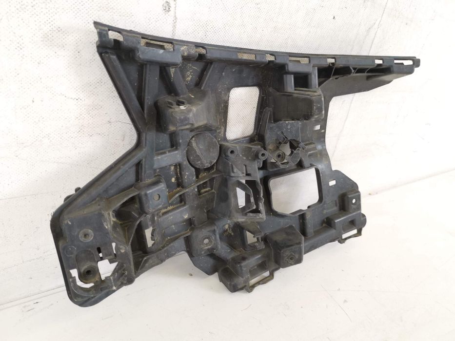 Ляв носач на предна броня Волво В40 2 [ - ] Оригинален, в добро състоя