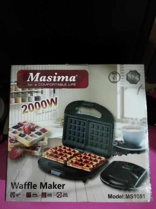 Вафельница новая в упаковке.