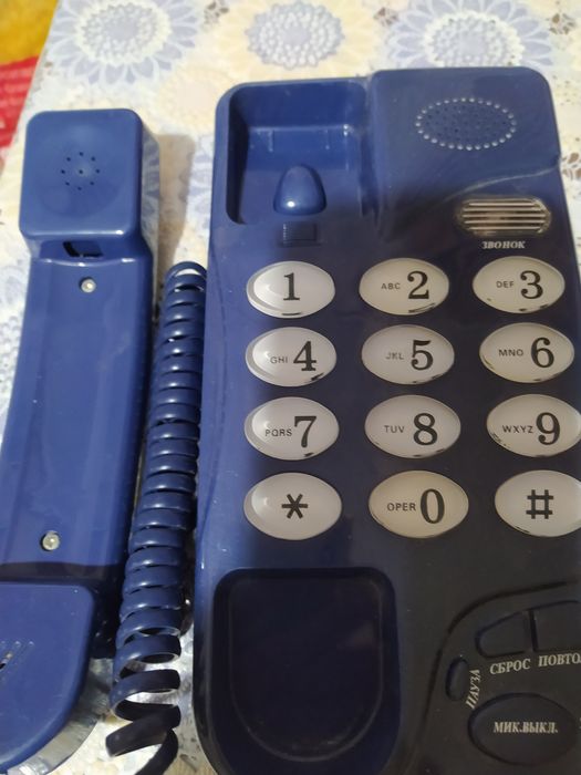 Продам  тюнер  от  спутниковой  антенны и телефон