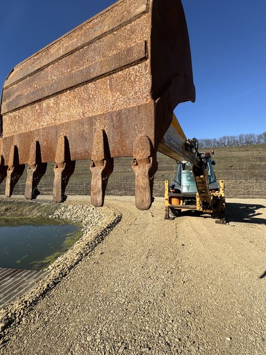 Buldoexcavator Case 580 Ranger impecabil  5700 ore de functionare