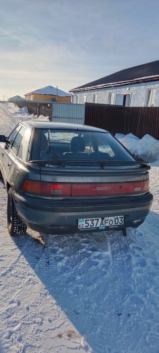 Мазда 323 на ходу