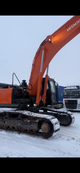 Экскаватор с вибропогружателем