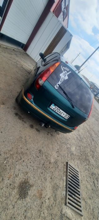 Ниссан алмера тино