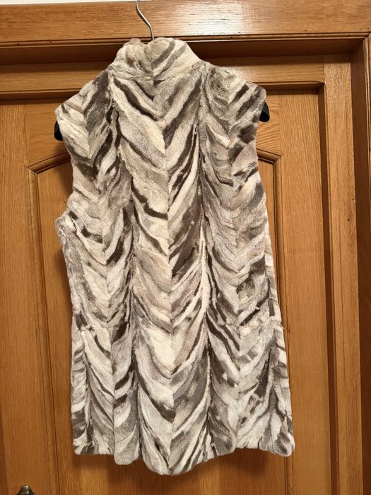 Vesta blana nurca tunsa