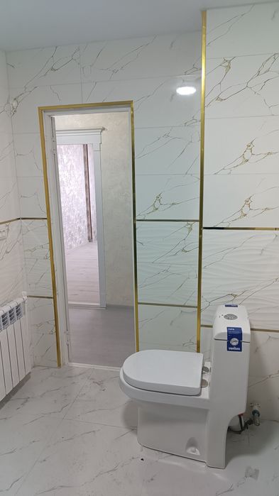 Андижан шахар Навруз Малл олдида сокин ситидан 11 этаждан 2-хонали уй