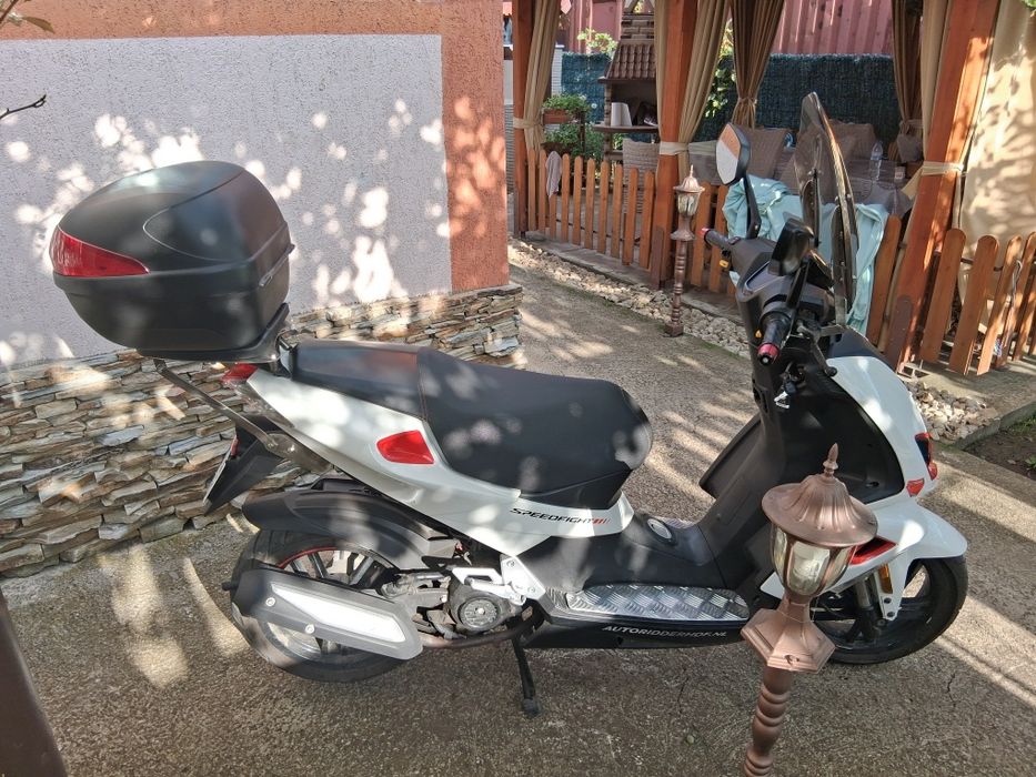 Скутер Peugeot spetfing 4