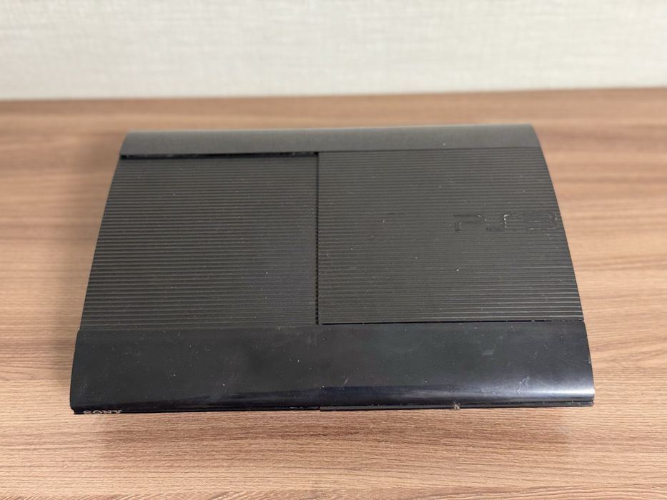 Прошитая PlayStation 3 + 65 игр