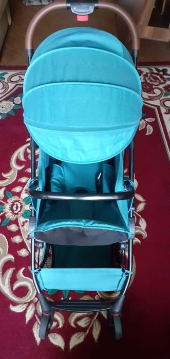 Детская прогулочная коляска всесезонная