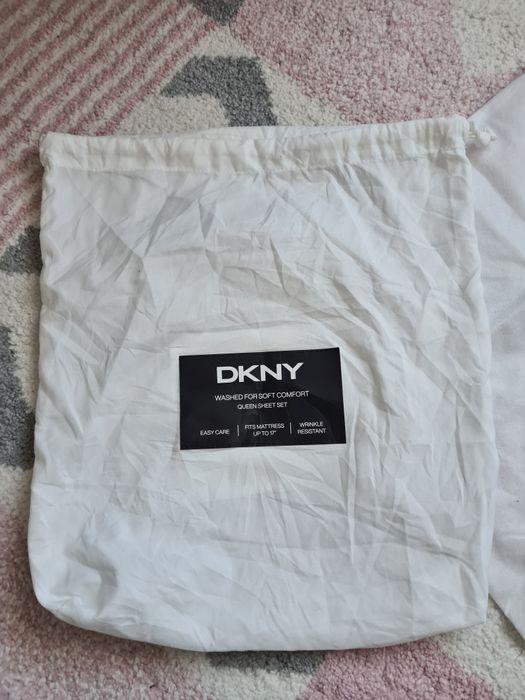 Saci de depozitare genti Guess și DKNY