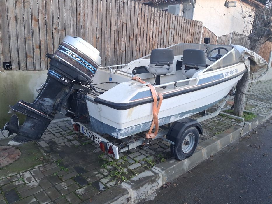 Barca Rio OLE 400 cu motor și peridoc
