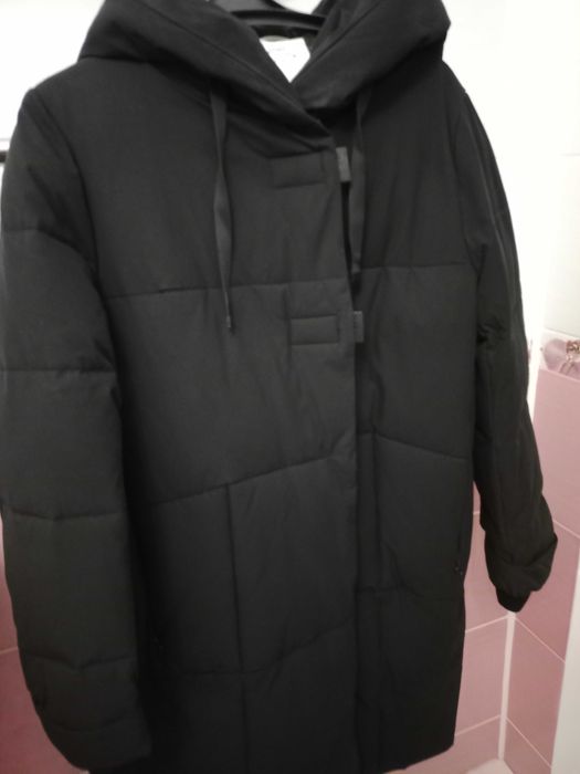 Продам пуховик новый