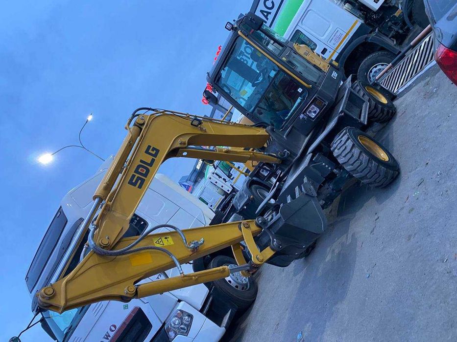 Колесный экскаватор SDLG E765F - 0,21 куб.м VOLVO Завод Ориент Озод