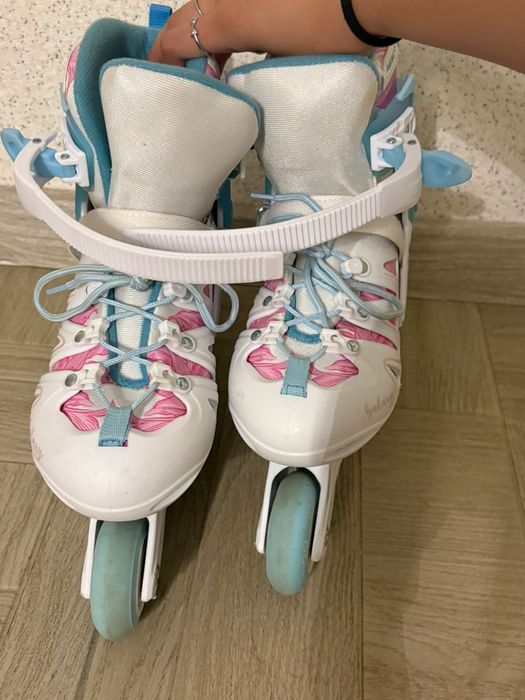 Роликовые коньки