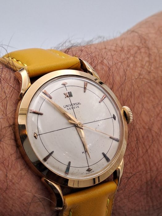 UNIVERSAL  GENEVE  aur masiv 18 kt