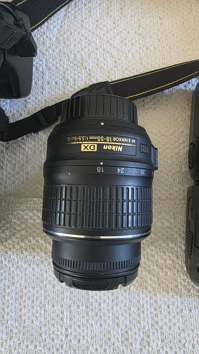 Nikon D3100 – Kit complet, stare foarte bună, doar ~20.600 cadre