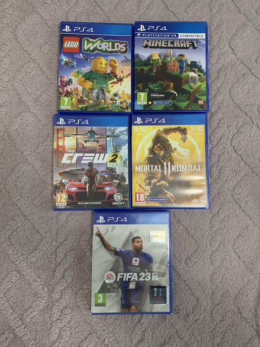 Consola  PlayStation 4 + 5 jocuri