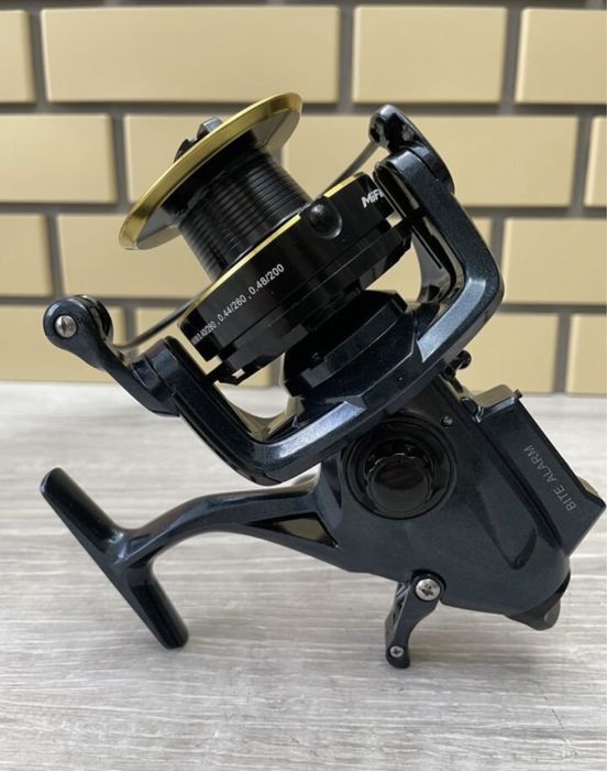 Катушка 7000  с сигнализатором поклёвки